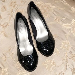 Black patent wedge pumps. Size 7.